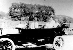 The Newcomb family ready for a Sunday Drive in 1915. Shown from left to right are the author's brothers Fred and Al, mother, Susan, and the author. The car is a 1915 'EMF' Studebaker.