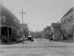 Abbott St. on the south side of the village. These are vehicles of village merchants making house-to-house sales!