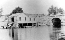 The Upper Falls Raquet Boat Club, downstream of the Needham Bridge, c. 1885