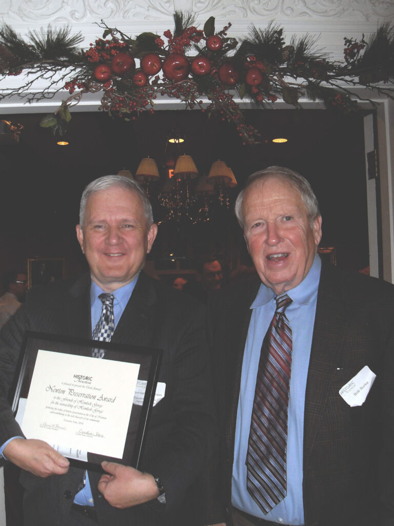 Brian Yates and Bob Burke, with Yates holding the Friends' award